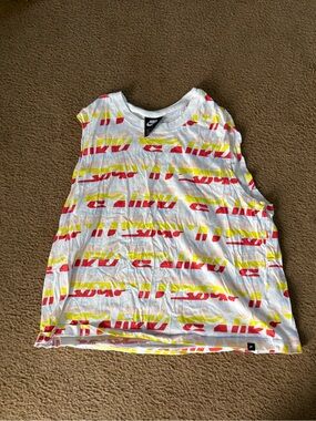 Nike Kids White Sleeveless Tank with Red & Yellow Graphic Stripes